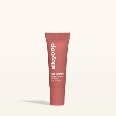 Lip balm tube with 'alleyoop' branding on a light beige background