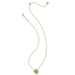 Gold necklace with a green pendant on a white background